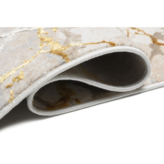 Preproga z zlatim vzorcem