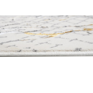 Vzorčasta preproga v krem barvi