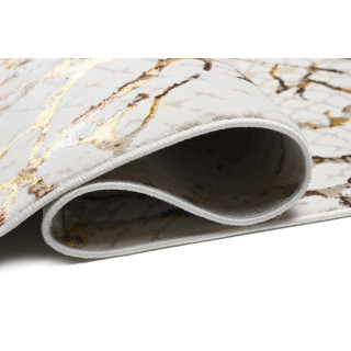 Krem preproga z zlatim vzorcem