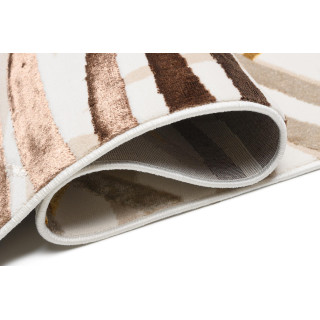 Krem preproga z zlatim motivom