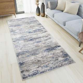 Modrý metrážny koberec so vzorom