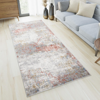 Bielo-oranžový metrážny koberec