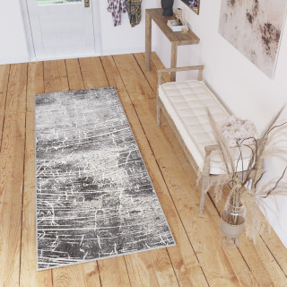 Krémový metrážny koberec s jemným vzorom