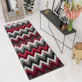 Sivo-červený metrážny koberec so vzorom