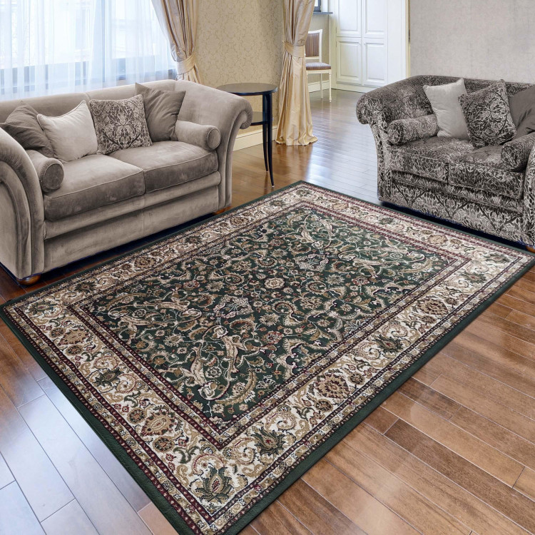 Zelený vintage koberec