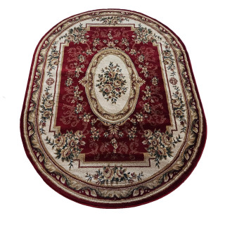 Oválny červený koberec so vzorom