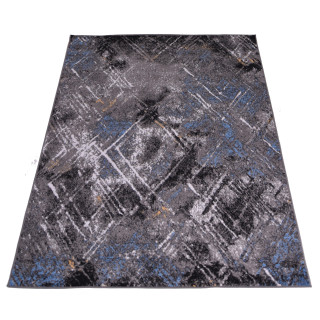 Koberec so vzorom v sivej farbe