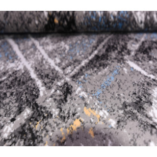 Koberec so vzorom v sivej farbe