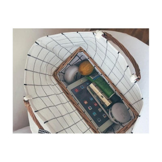 Karirasta pletena torbica iz blaga v bež barvi