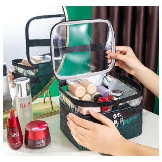 Potovalna kozmetična torbica zelene barve z vzorcem