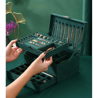 Zelena škatla za nakit s številnimi predelki