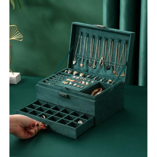 Zelena škatla za nakit s številnimi predelki