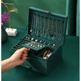 Zelena škatla za nakit s številnimi predelki