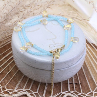 Pozlačena modra zapestnica za roko