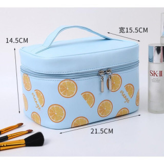 Modra kozmetična torbica s pomarančami