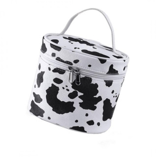 Bela kozmetična torbica z madeži