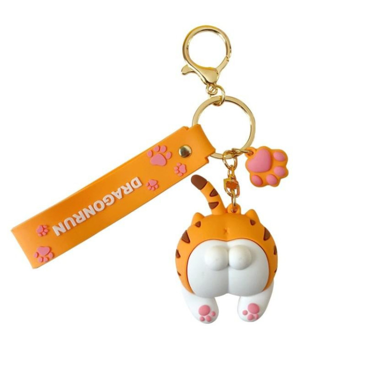 Oranžen obesek za ključe z mačjo zadnjico