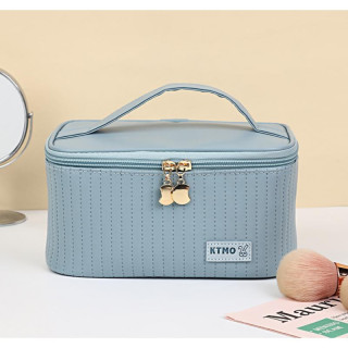 Modra kozmetična torbica