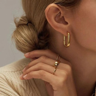 Ženski uhani v zlati barvi