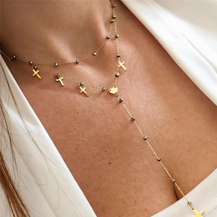 Pozlačena ogrlica s križci