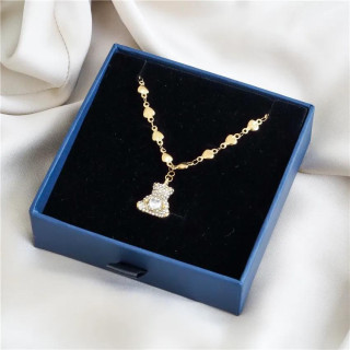 Pozlačena ogrlica srček z medvedkom