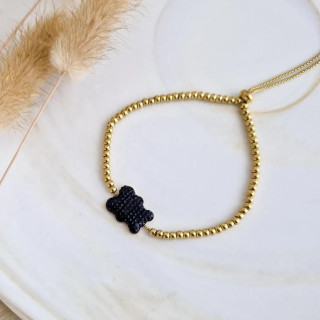 Pozlačena zapestnica zlate barve na roki