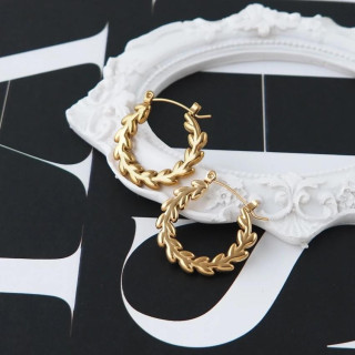 Ženski pozlačeni okrogli uhani