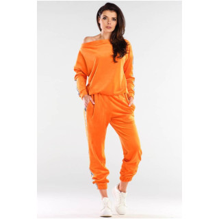 Oranžne ženske trenirke iz velurja s kontrastnimi trakovi