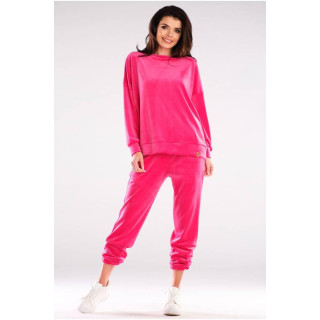 Ženske trenirke iz velurja z manšetami v roza barvi