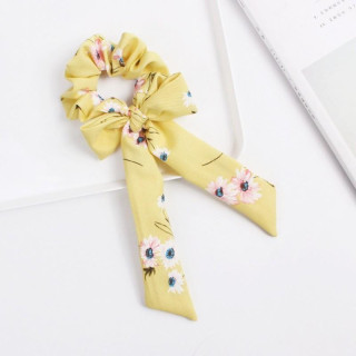 Gumb za lase z rumenimi cvetovi