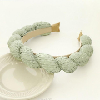 Ženski pleten naglavni trak v zeleni barvi