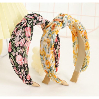 Črn naglavni trak s cvetovi in vozlom