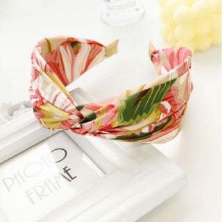 Vzorčast roza naglavni trak z vozlom