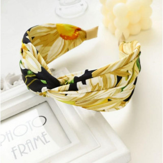 Rumeno-črn vzorčast naglavni trak z vozlom