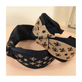 Vzorčast črn naglavni trak z vozlom