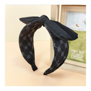 Vzorčast črn naglavni trak s pentljo