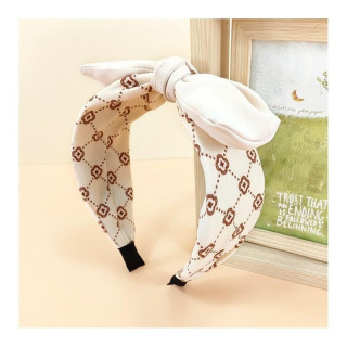 Vzorčast krem naglavni trak s pentljo