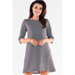 Črno-bela trapezna obleka z vzorcem