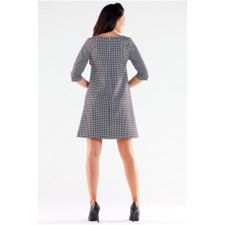 Črno-bela trapezna obleka z vzorcem