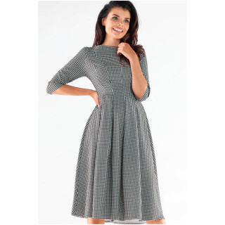 Ženska podaljšana črno-bela obleka z vzorcem