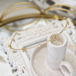 Naglavni trak z zlatimi rožami