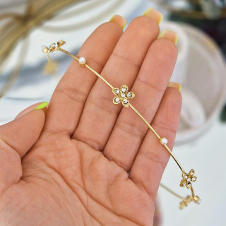 Naglavni trak z zlatimi rožami