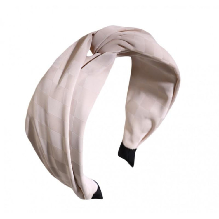 Vzorčast naglavni trak