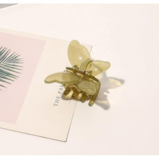 Zelena sponka za lase v obliki metuljčka