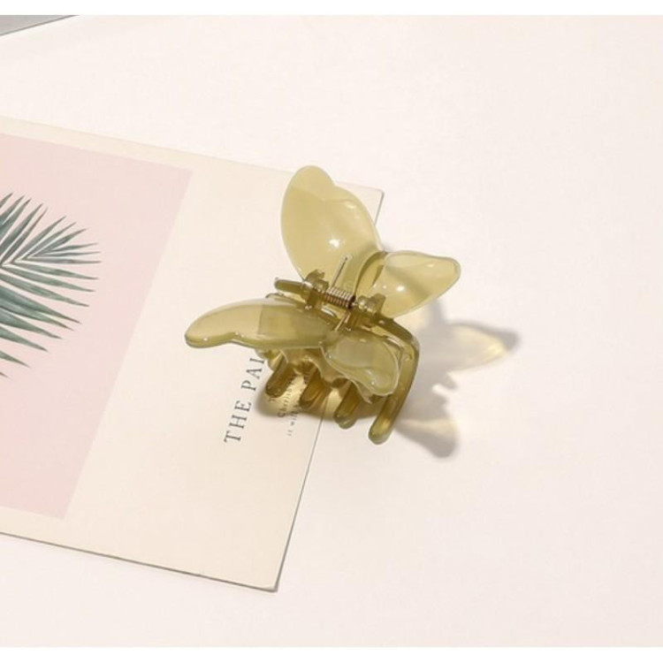 Zelena sponka za lase v obliki metuljčka