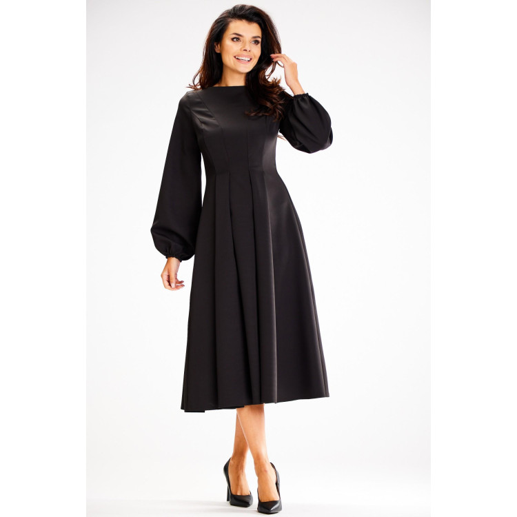 Ženska podaljšana midi obleka v črni barvi