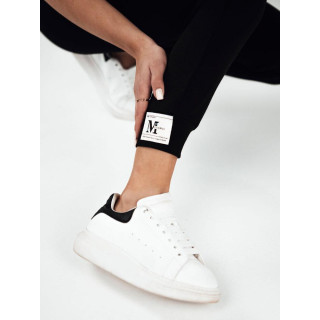 Črne ženske trenirke z našitkom