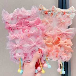 Set 10 pentlj za lase v roza barvi