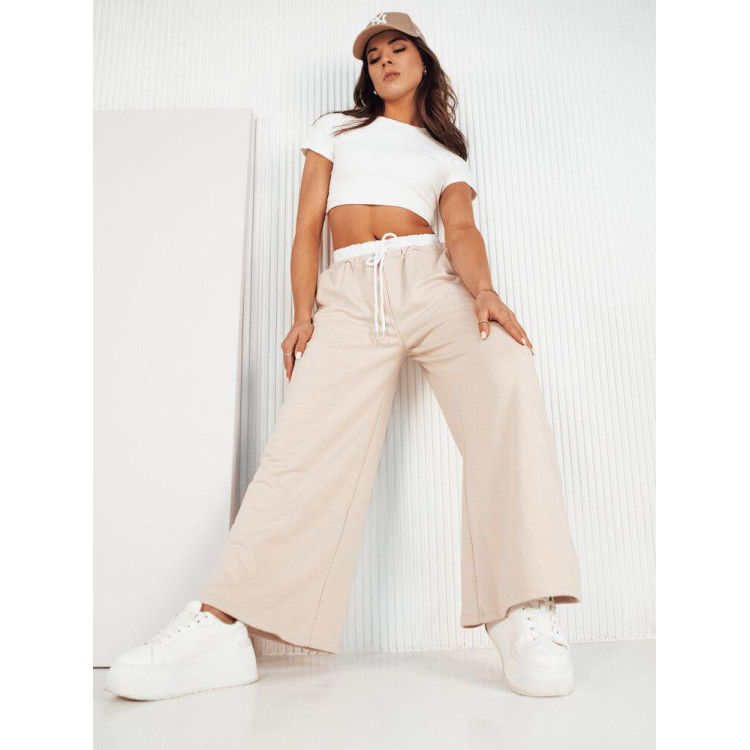 Široke ženske hlače v bež barvi