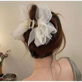 Bela pentlja za zatilne lase